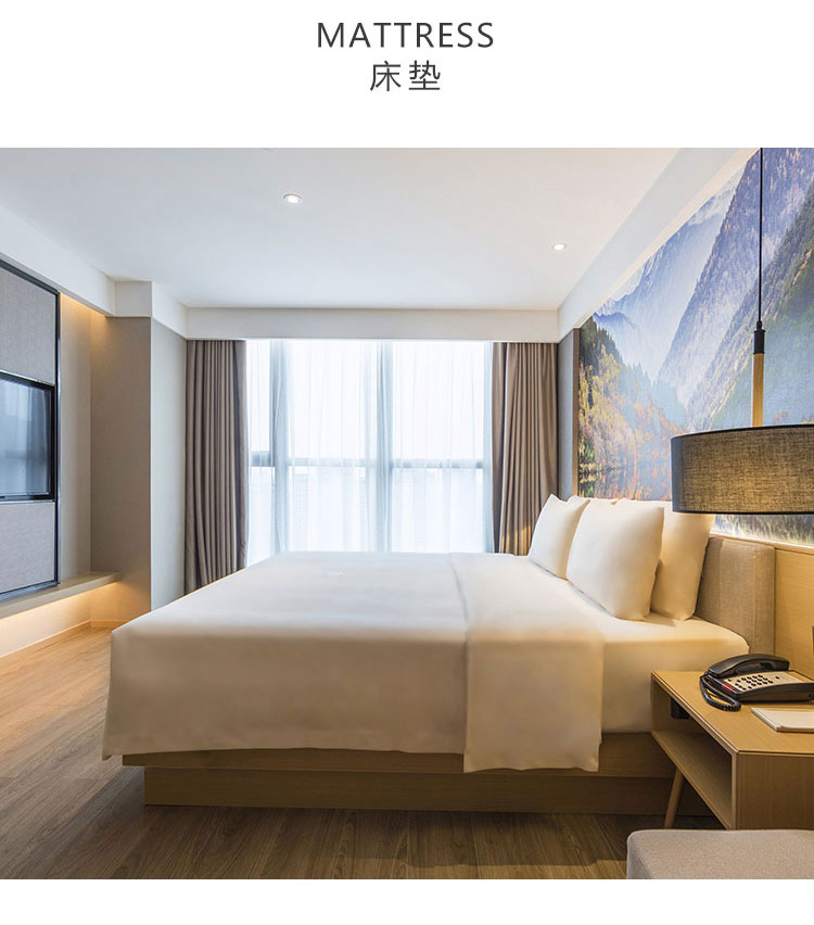 酒店客房床圖片